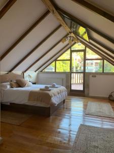 Ένα ή περισσότερα κρεβάτια σε δωμάτιο στο Casa con amplio jardín en Pechón