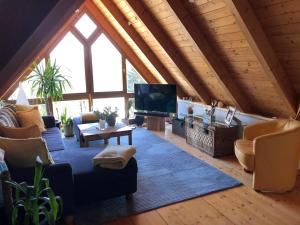A television and/or entertainment centre at Charmantes Bauernhaus in erhöhter Aussichtslage