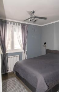 Voodi või voodid majutusasutuse Athena Apartman toas