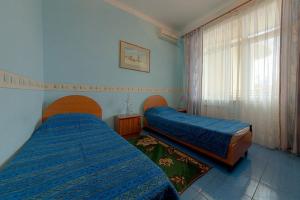 Krevet ili kreveti u jedinici u okviru objekta Yamal Hotel