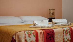 Cama ou camas em um quarto em Cabañas y Hostal Las Marias