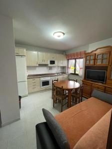 Η κουζίνα ή μικρή κουζίνα στο Apartamentos Mirador del Cantábrico