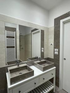 Koupelna v ubytování Suite 55 in centro