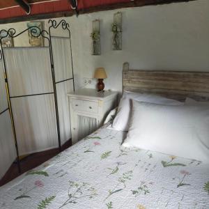 Cama o camas de una habitación en Vivienda Rural La choza