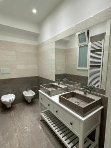 Koupelna v ubytování Suite 55 in centro