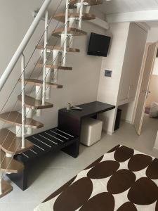 TV a/nebo společenská místnost v ubytování Residence PEGA B&B