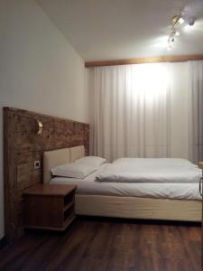 Postel nebo postele na pokoji v ubytování Chalet Helen