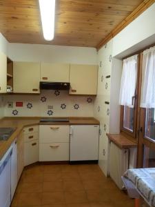 Kuchyň nebo kuchyňský kout v ubytování Chalet Helen