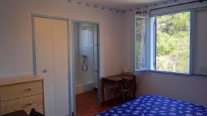 Postel nebo postele na pokoji v ubytování Residence Funtanella