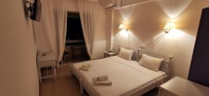 Postel nebo postele na pokoji v ubytování Hotel Rania