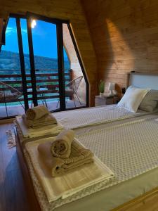 Tempat tidur dalam kamar di Vila Grujic