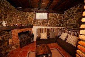 Posezení v ubytování Casa Rural El Corquieu de la Cava + 31 fotografií