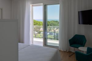 Postel nebo postele na pokoji v ubytování Hotel Bauer & Sporting + 37 fotografií