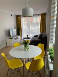 Posedenie v ubytovaní Olivkowe apartamenty