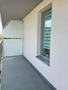 Balkón alebo terasa v ubytovaní Olivkowe apartamenty