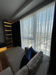 Posezení v ubytování Brand-New 2-bedroom apartment near Mall of Istanbul - Gul 85-239