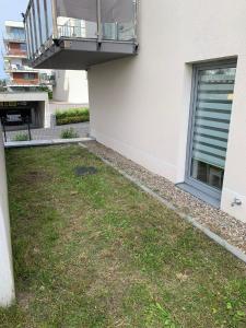 Vonkajšia záhrada v ubytovaní Olivkowe apartamenty
