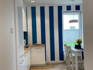Kuchyňa alebo kuchynka v ubytovaní Olivkowe apartamenty