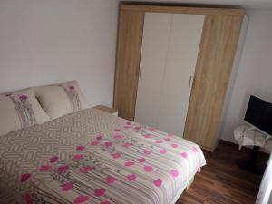 Postel nebo postele na pokoji v ubytování Apartment Mia