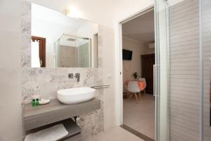Koupelna v ubytování Lu Lioni Rooms
