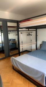 Posteľ alebo postele v izbe v ubytovaní Appartement Lumineux de 90 m2 situé en centre ville