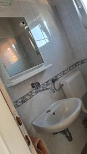 Koupelna v ubytování Apartment Mia