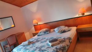 Postel nebo postele na pokoji v ubytování Apartment Mia