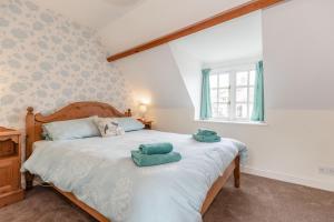 Krevet ili kreveti u jedinici u okviru objekta Brincliffe Cottage