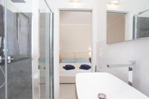 Koupelna v ubytování Lu Lioni Rooms