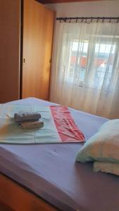Postel nebo postele na pokoji v ubytování Apartment Mia
