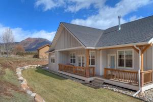 a house with a porch and a deck at 436 Estancia Loop in Hermosa