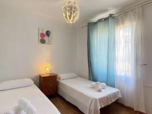 Postel nebo postele na pokoji v ubytování Villa Madrid Private Pool Casasol + 37 fotografií