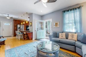 a living room with a couch and a table at Town of Rehoboth Beach 109 Country Club Dr in Rehoboth Beach