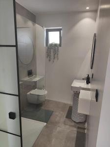Koupelna v ubytování Apartment by B&D