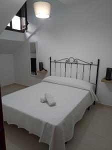 Postel nebo postele na pokoji v ubytování Balcon del olivar