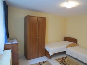 Кровать или кровати в номере Galagonyás apartman