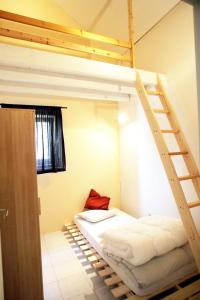Katil atau katil-katil dalam bilik di Apartment 't Maanhof
