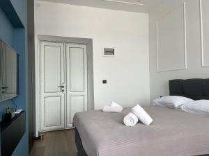 Posteľ alebo postele v izbe v ubytovaní Navis city apartments
