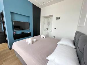 Posteľ alebo postele v izbe v ubytovaní Navis city apartments