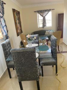 a living room with a table and chairs at Marbella1 in Los Frailes