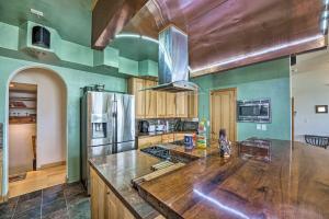a kitchen with a wooden counter top in a room at Lakefront Country Home with Waterslide and Trampoline! in Wheatland