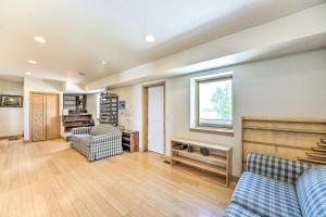 a living room with two couches and a window at Lakefront Country Home with Waterslide and Trampoline! in Wheatland