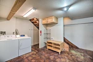 a laundry room with a washer and dryer at Lakefront Country Home with Waterslide and Trampoline! in Wheatland