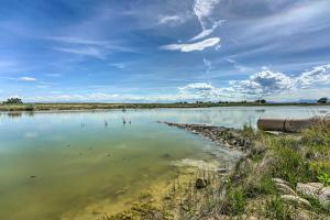a view of a large body of water at Lakefront Country Home with Waterslide and Trampoline! in Wheatland