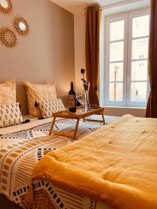 En eller flere senge i et værelse på Maison De La Tour