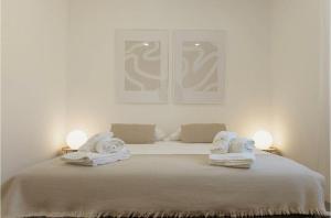 En eller flere senge i et værelse på Casa da Lota 1º