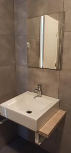 Koupelna v ubytování APC Apartamento Palmela Village + 15 fotografií