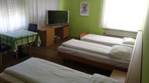 Postel nebo postele na pokoji v ubytování Hotel Mare & Monti