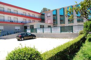 Budova, kde se hotel nachází + 18 fotografií
