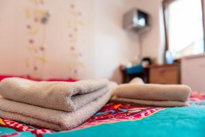 Postel nebo postele na pokoji v ubytování Center Walk Room